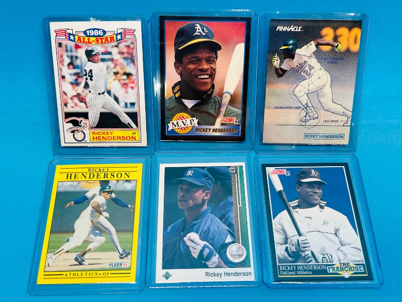 Photo 1 of 593327…Rickey Henderson cards in hard plastic sleeves 