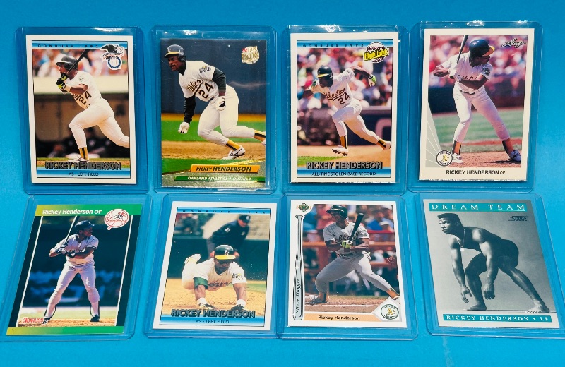 Photo 1 of 593340…Rickey Henderson cards in hard plastic sleeves 
