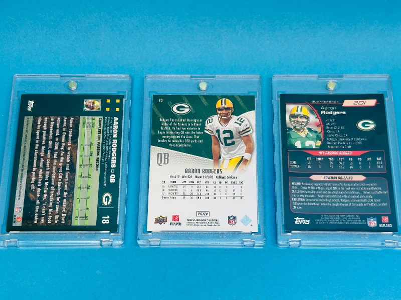 Photo 1 of 593345…3 Aaron Rodgers  cards in hard plastic cases