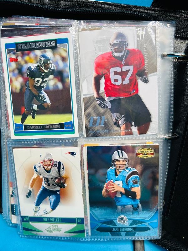 Photo 1 of 593346…final sale no returns/refunds-104 mixed chrome/foil/holo football cards in binder