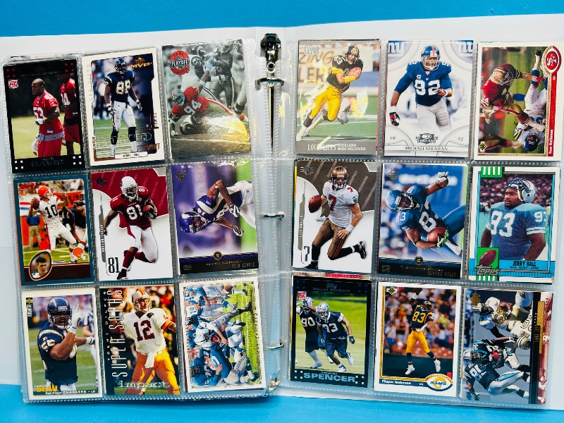 Photo 1 of 593348… final sale no returns/refunds-360 mixed football cards in binder 