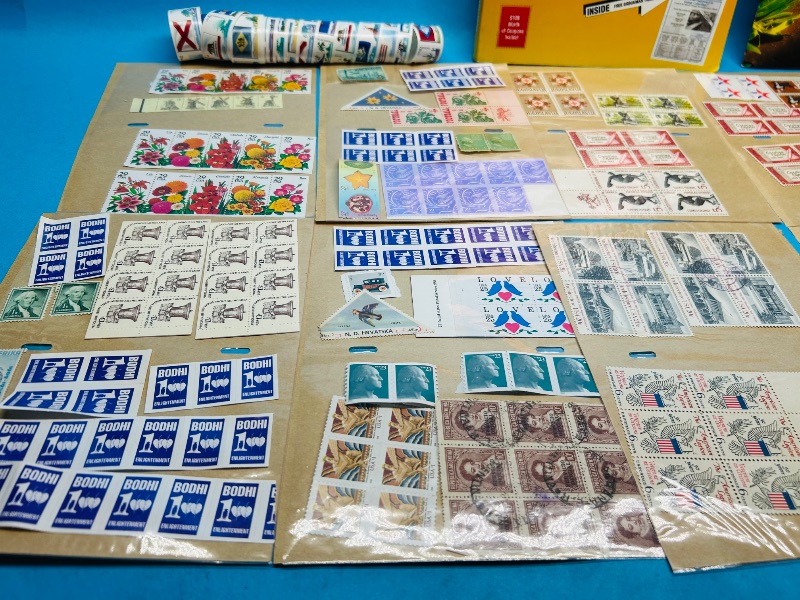 Photo 1 of 593351…stamp collection and books- some used