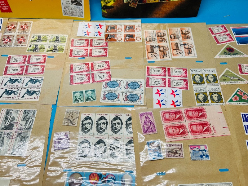 Photo 1 of 593351…stamp collection and books- some used