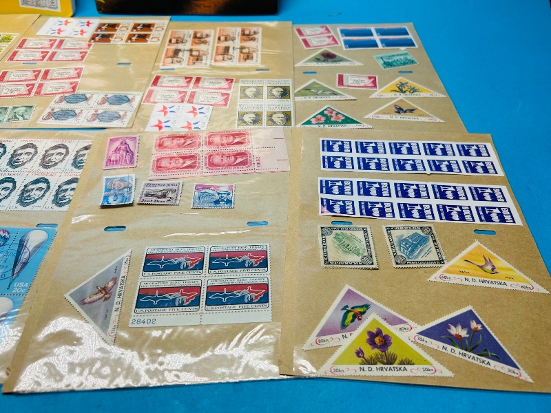 Photo 1 of 593351…stamp collection and books- some used