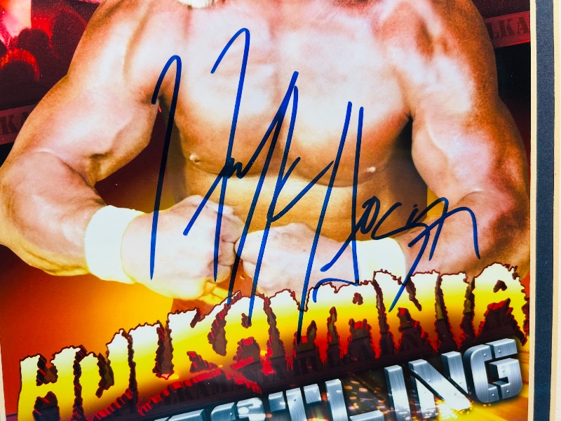 Photo 1 of 593353…framed Hulk Hogan signed picture 16 x 13” COA on back