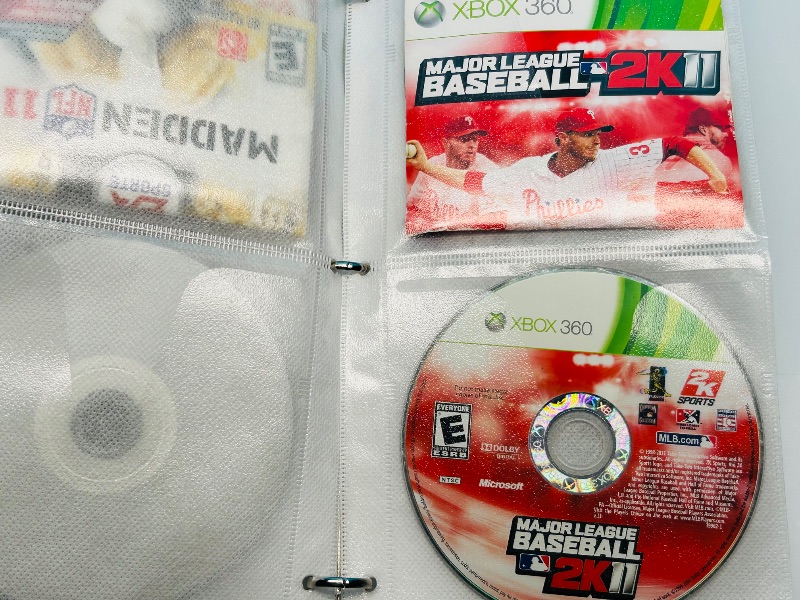 Photo 1 of 593355…10 XBOX and Wii sports game discs in binder-see photos 