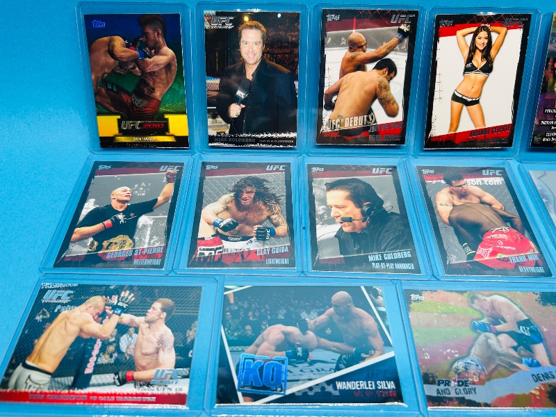 Photo 1 of 593358…UFC cards in plastic sleeves 