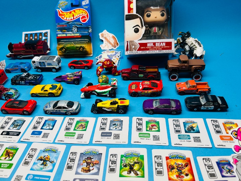 Photo 1 of 593359…die cast cars,  stickers  and toys 