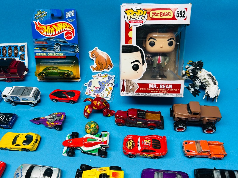 Photo 1 of 593359…die cast cars,  stickers  and toys 