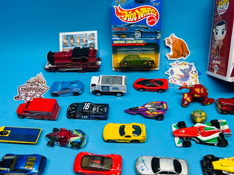 Photo 1 of 593359…die cast cars,  stickers  and toys 