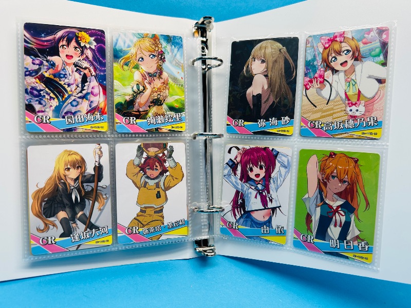 Photo 1 of 593360…final sale no returns/refunds-56 anime cards in binder