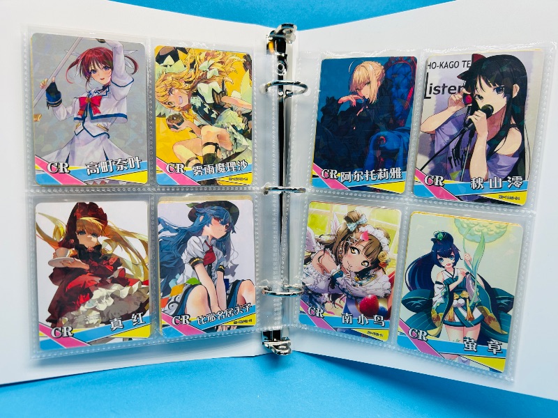Photo 1 of 593360…final sale no returns/refunds-56 anime cards in binder
