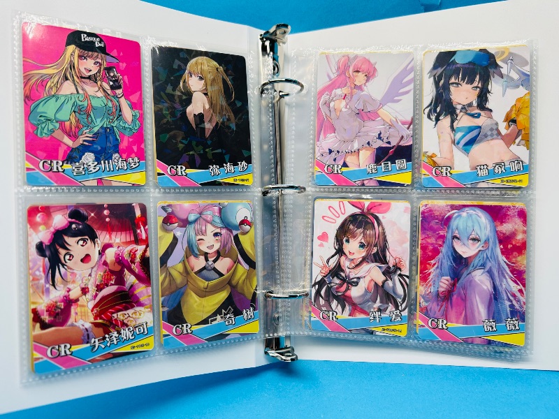 Photo 1 of 593360…final sale no returns/refunds-56 anime cards in binder