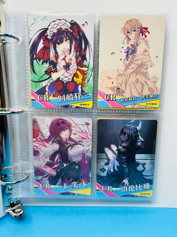 Photo 1 of 593360…final sale no returns/refunds-56 anime cards in binder
