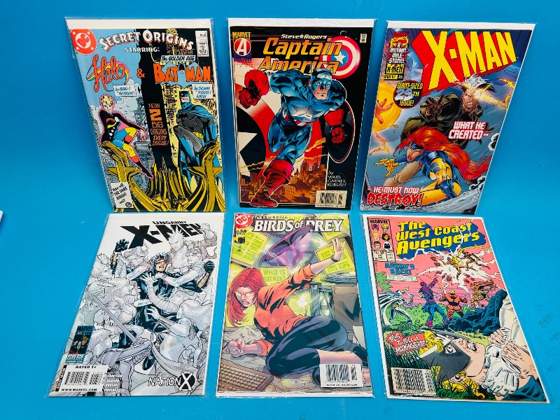 Photo 1 of 593385…6  comics in plastic sleeves 