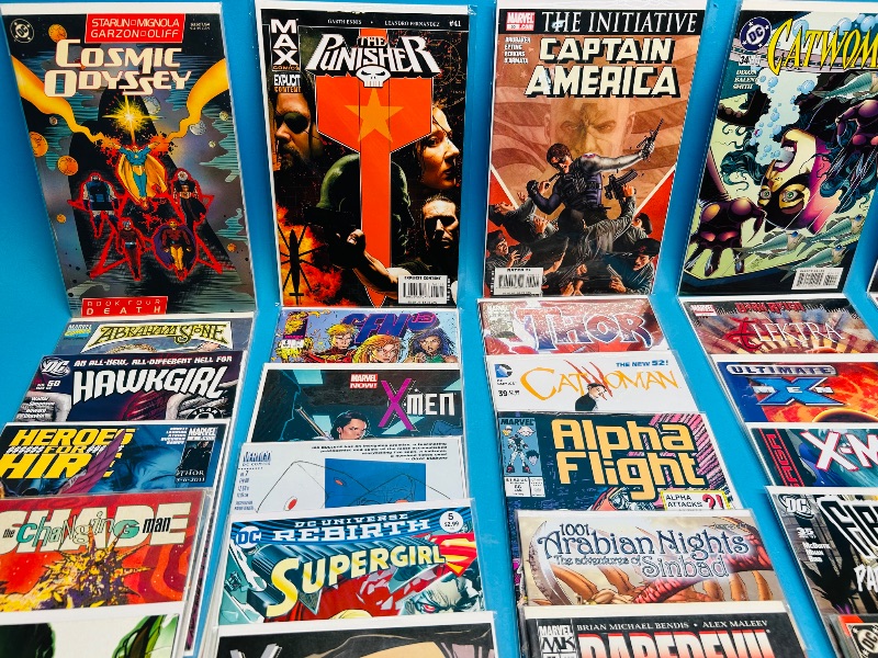 Photo 1 of 593389…final sale no returns/refunds-30 comics in plastic sleeves 