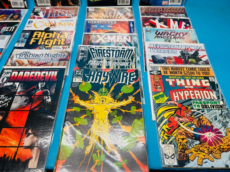 Photo 1 of 593389…final sale no returns/refunds-30 comics in plastic sleeves 