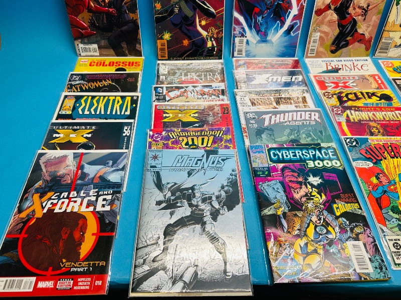 Photo 1 of 593390… final sale no returns/refunds-30 comics in plastic sleeves 