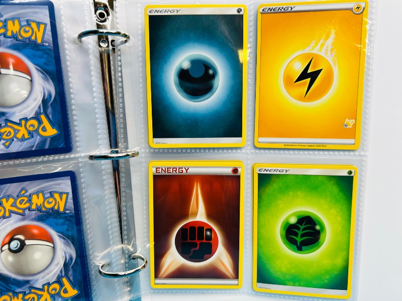 Photo 1 of 593394…  final sale no returns/refunds-60 mixed Pokemon Energy cards in binder