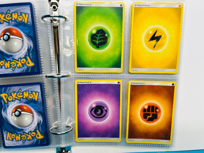 Photo 1 of 593394…  final sale no returns/refunds-60 mixed Pokemon Energy cards in binder