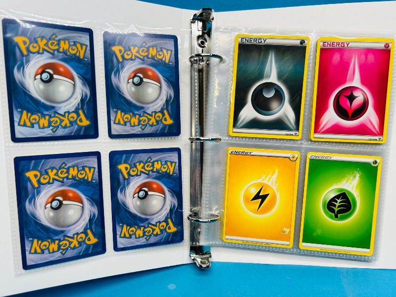 Photo 1 of 593394…  final sale no returns/refunds-60 mixed Pokemon Energy cards in binder