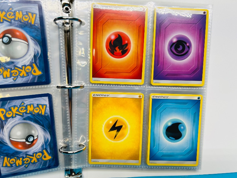 Photo 1 of 593394…  final sale no returns/refunds-60 mixed Pokemon Energy cards in binder