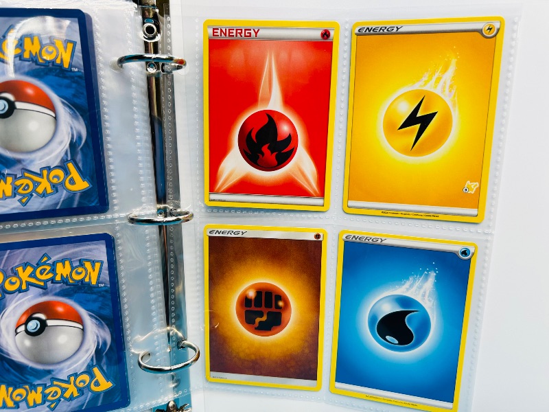 Photo 1 of 593394…  final sale no returns/refunds-60 mixed Pokemon Energy cards in binder