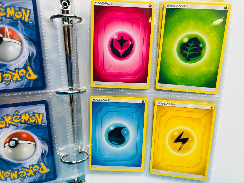 Photo 1 of 593394…  final sale no returns/refunds-60 mixed Pokemon Energy cards in binder