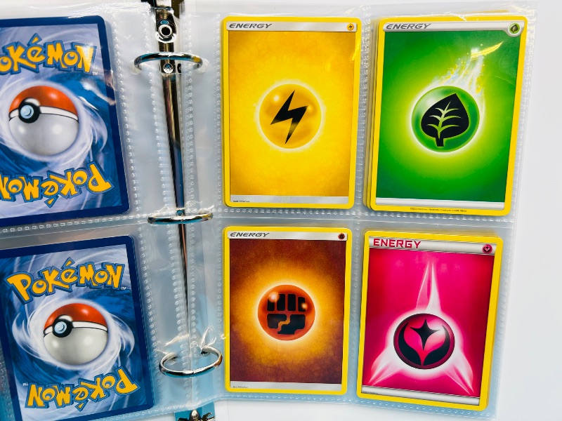 Photo 1 of 593394…  final sale no returns/refunds-60 mixed Pokemon Energy cards in binder
