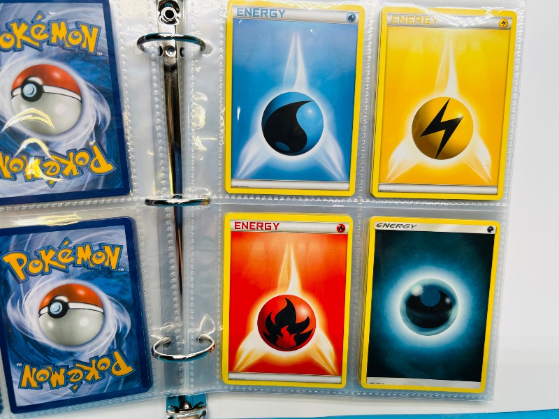 Photo 1 of 593394…  final sale no returns/refunds-60 mixed Pokemon Energy cards in binder