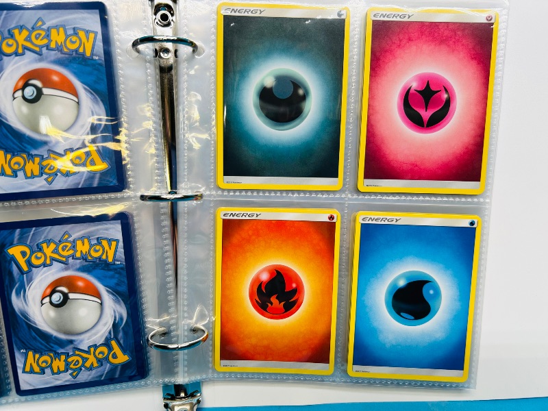 Photo 1 of 593394…  final sale no returns/refunds-60 mixed Pokemon Energy cards in binder