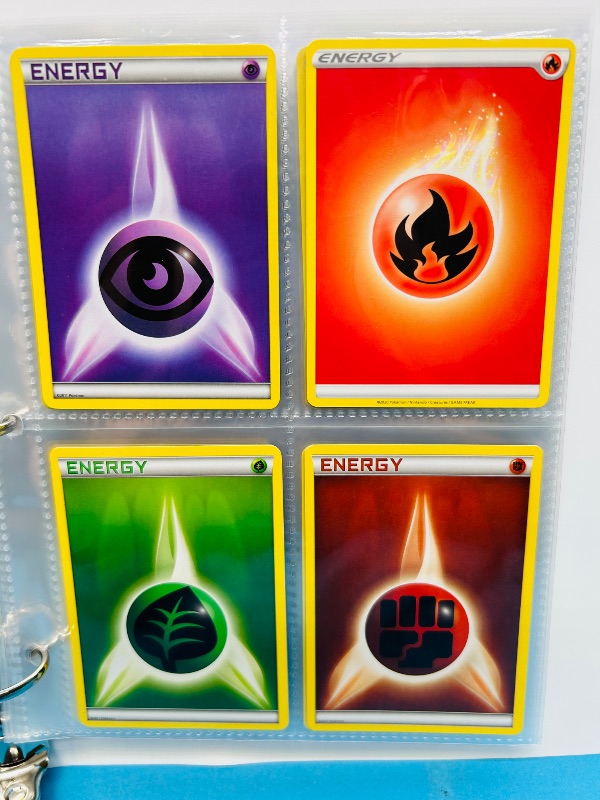 Photo 1 of 593394…  final sale no returns/refunds-60 mixed Pokemon Energy cards in binder