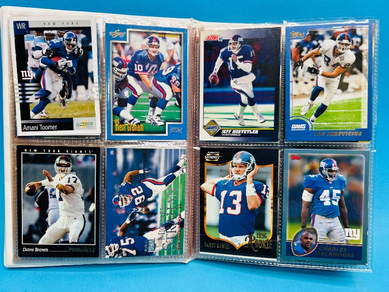 Photo 1 of 593395…  final sale no returns/refunds-96 mixed New York Giants cards in binder