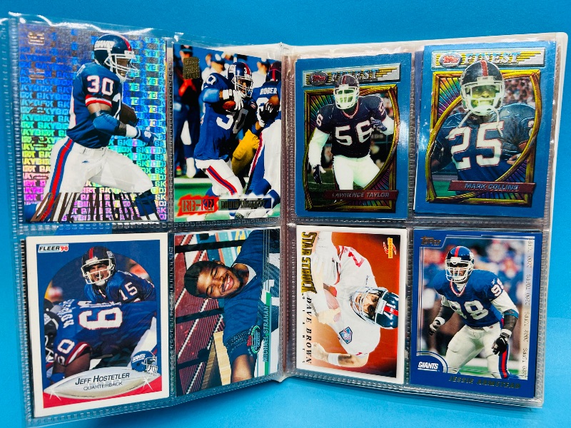 Photo 1 of 593395…  final sale no returns/refunds-96 mixed New York Giants cards in binder
