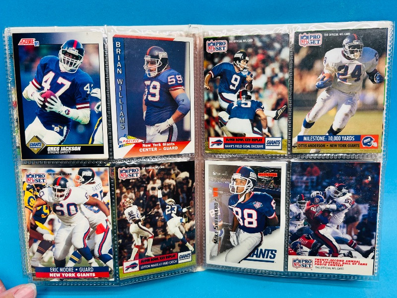 Photo 1 of 593395…  final sale no returns/refunds-96 mixed New York Giants cards in binder
