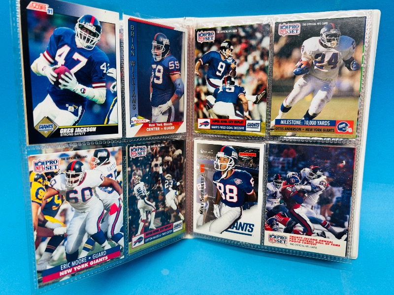 Photo 1 of 593395…  final sale no returns/refunds-96 mixed New York Giants cards in binder