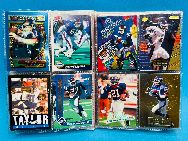 Photo 1 of 593395…  final sale no returns/refunds-96 mixed New York Giants cards in binder