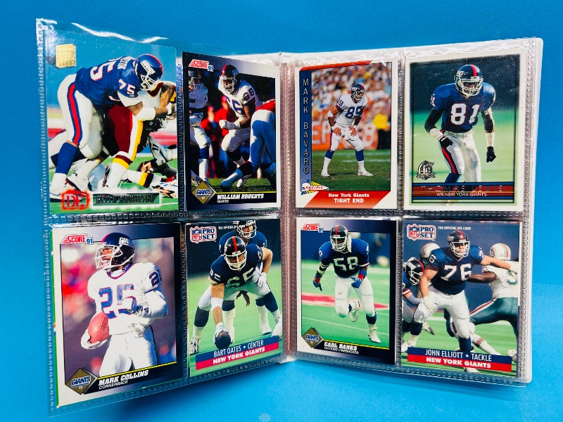 Photo 1 of 593395…  final sale no returns/refunds-96 mixed New York Giants cards in binder