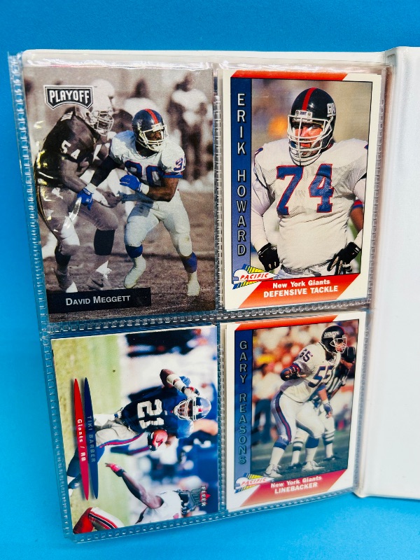 Photo 1 of 593395…  final sale no returns/refunds-96 mixed New York Giants cards in binder