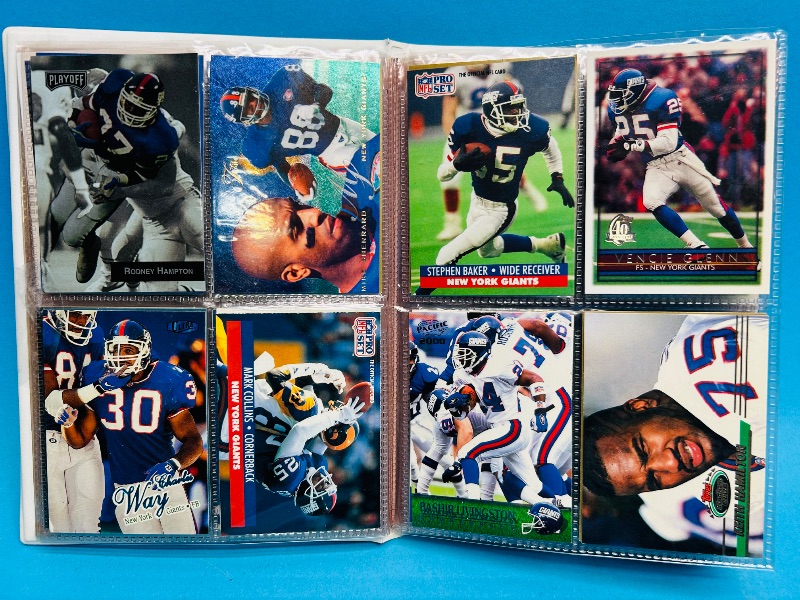 Photo 1 of 593395…  final sale no returns/refunds-96 mixed New York Giants cards in binder