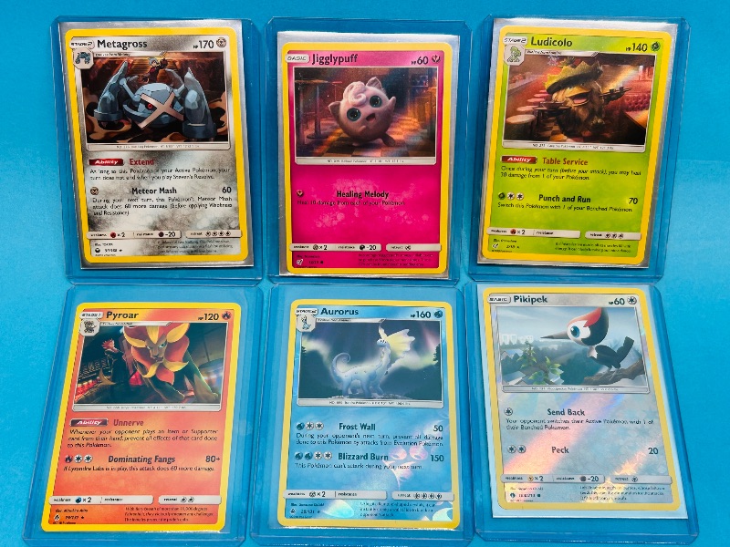 Photo 1 of 593406… 6 reverse and holo Pokémon cards in hard plastic sleeves 