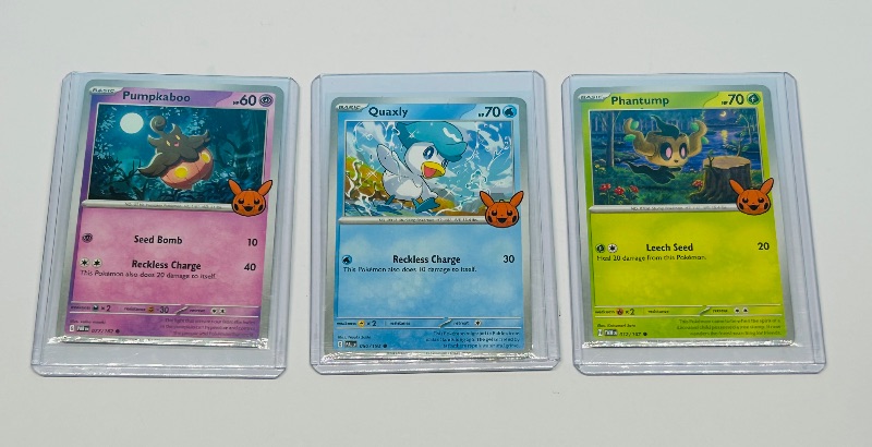Photo 1 of 593443… 3  trick or trade Pokémon cards in hard plastic sleeves 