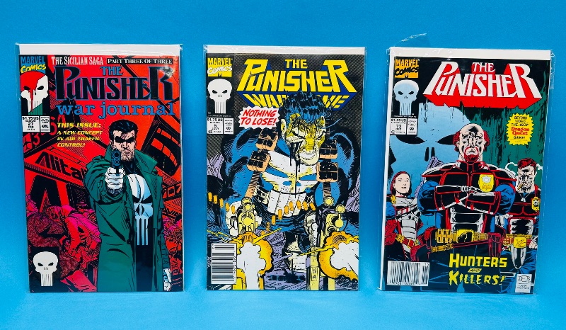 Photo 1 of 593486…3 punisher comics in plastic sleeves 