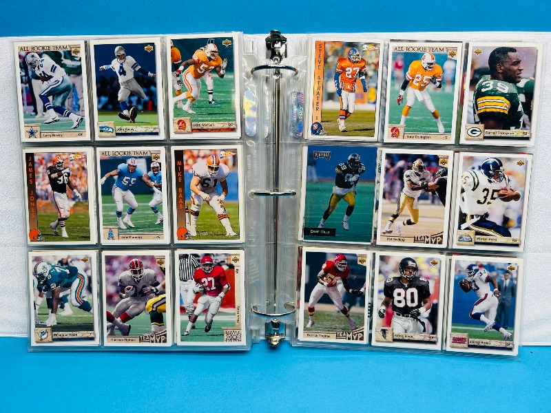 Photo 1 of 593533…  final sale no returns/refunds-396 mixed football cards in binder 