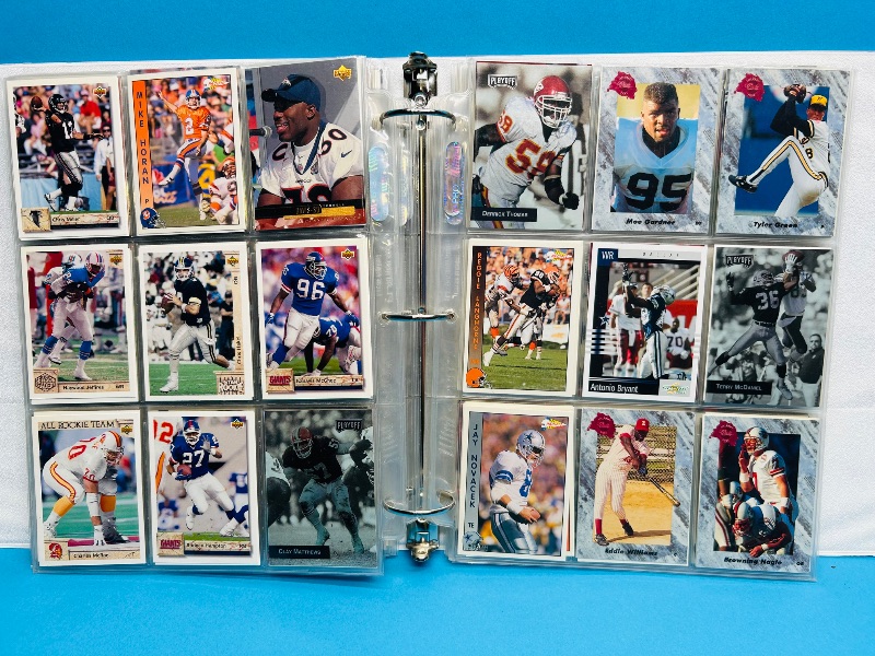 Photo 1 of 593533…  final sale no returns/refunds-396 mixed football cards in binder 