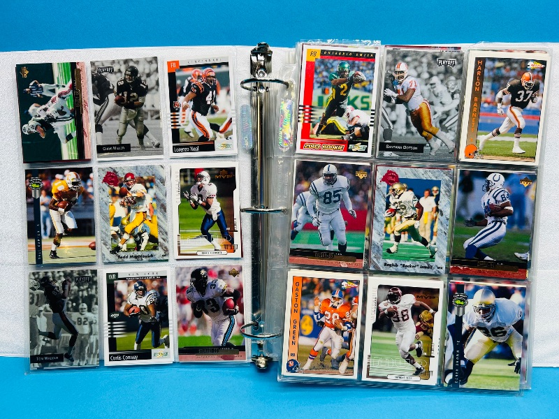 Photo 1 of 593533…  final sale no returns/refunds-396 mixed football cards in binder 