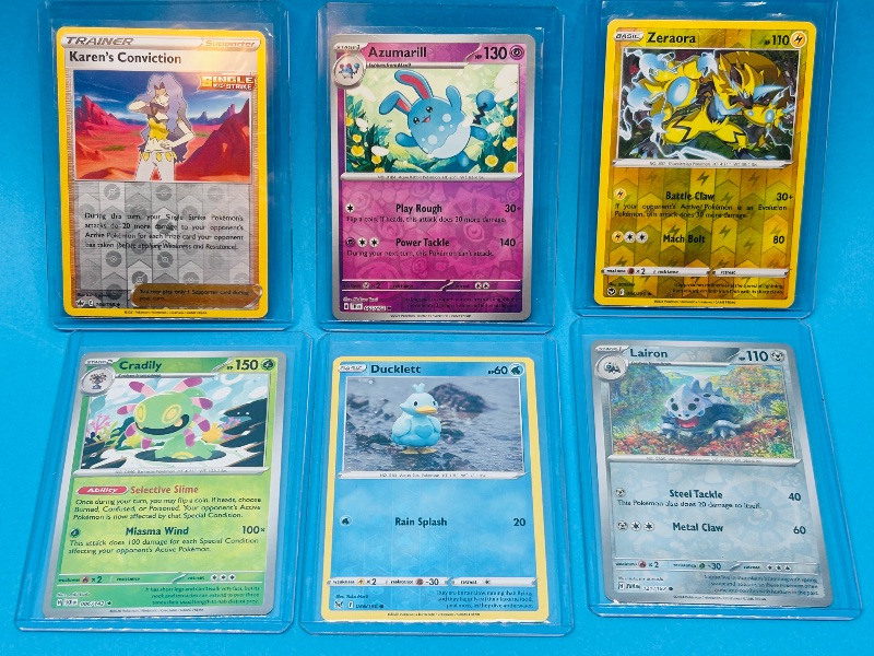 Photo 1 of 593571… 6 reverse holo Pokémon card in hard plastic sleeves 
