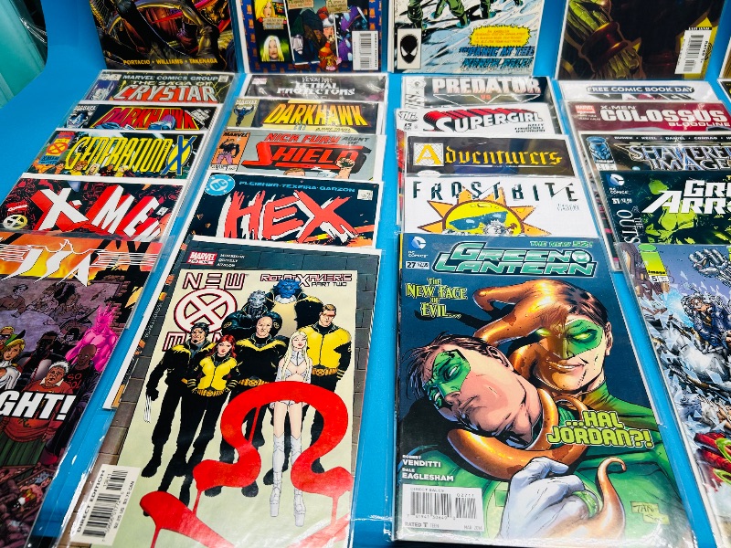 Photo 1 of 593602… final sale no returns/refunds-30 comics in plastic sleeves 
