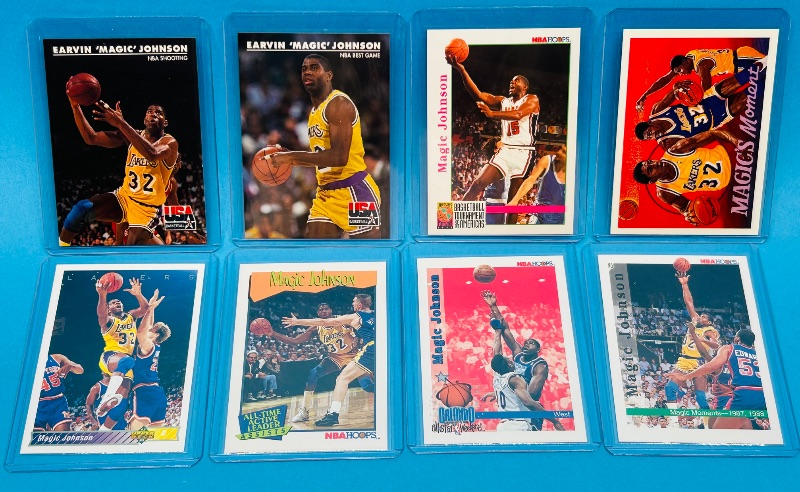 Photo 1 of 593654…8 Magic Johnson cards in hard plastic sleeves