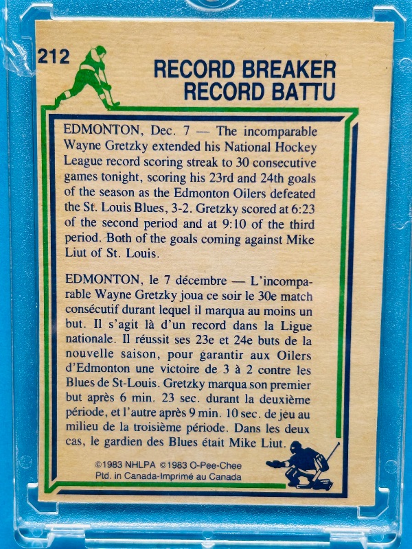 Photo 1 of 593659…1983 Wayne Gretzky record breaker card 212 in hard plastic case